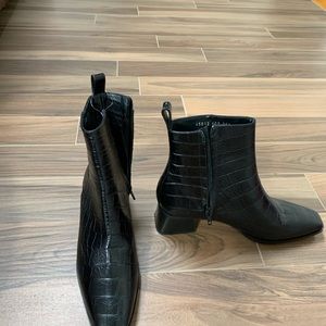 I am not wearing heels anymore.